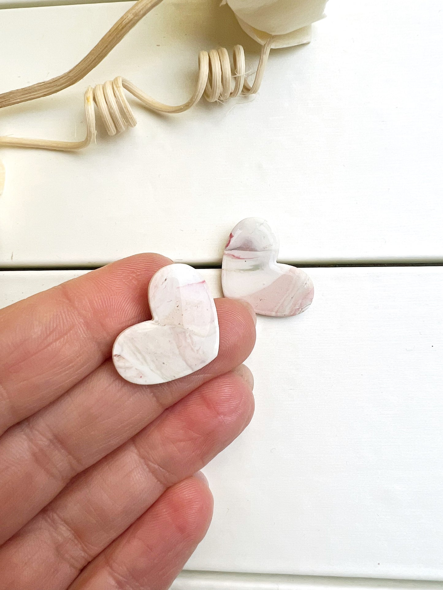 Handcrafted white and pink marbled heart earrings