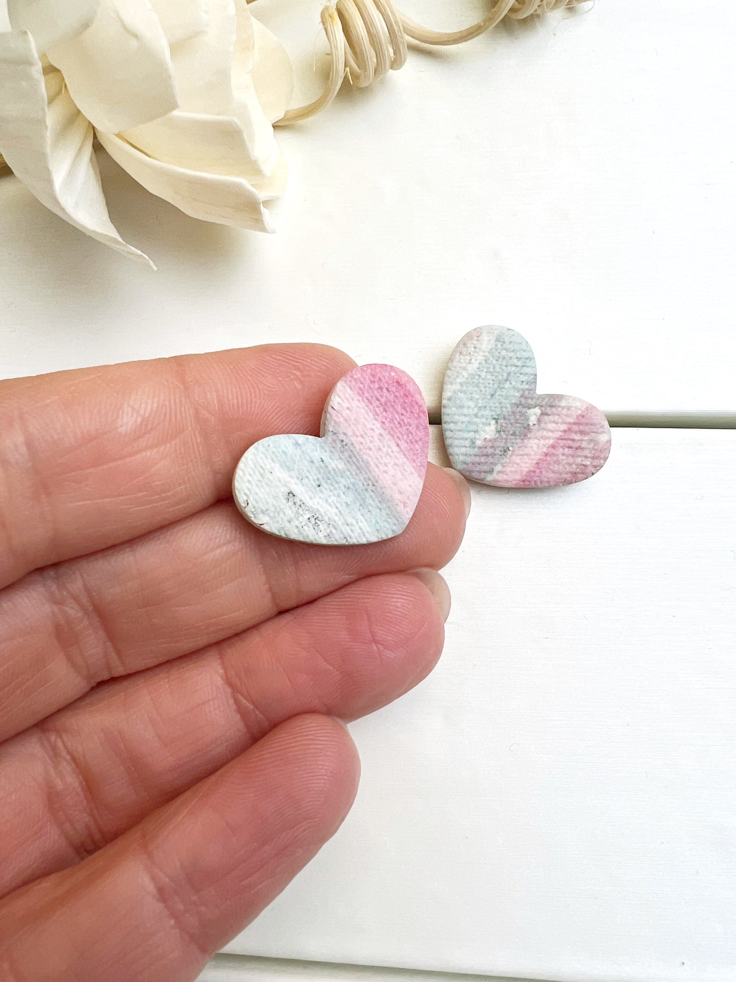 Pastel heart earrings with fabric texture