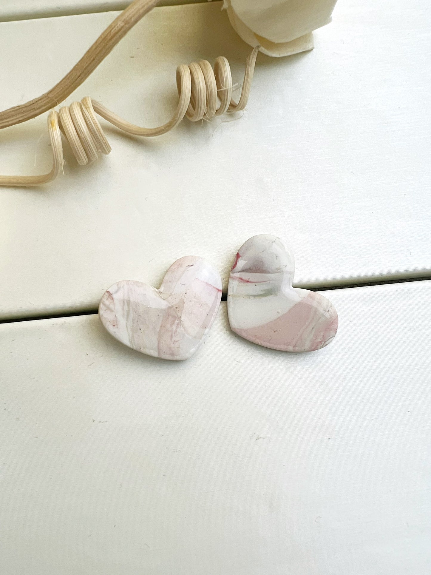 Handcrafted white and pink marbled heart earrings